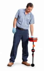plumbing contractor uses a leak detection device